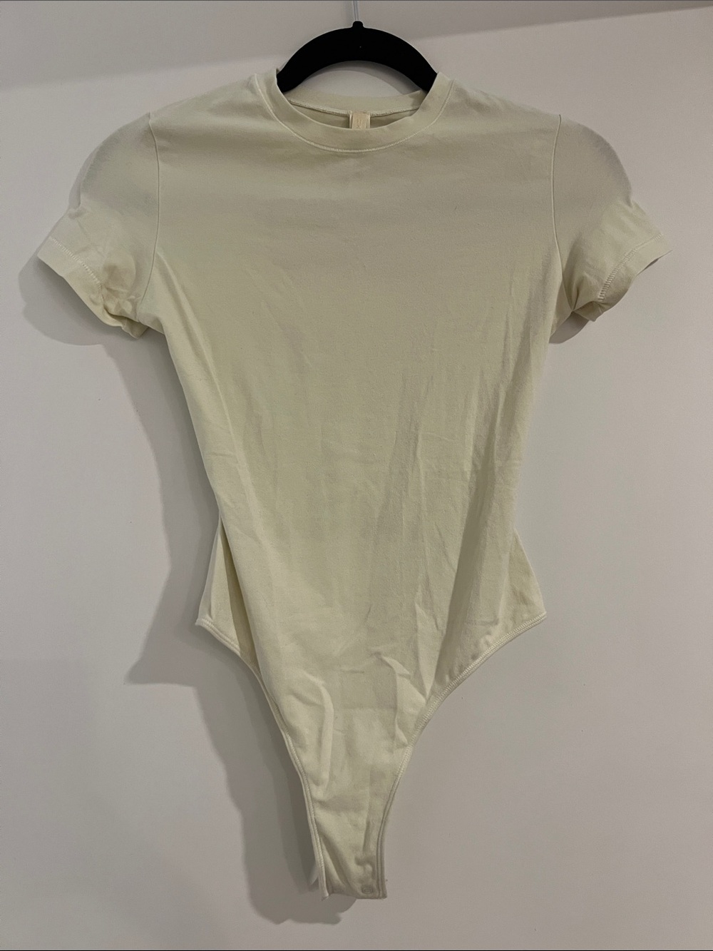 Skims Short-Sleeve Bodysuit in Cream